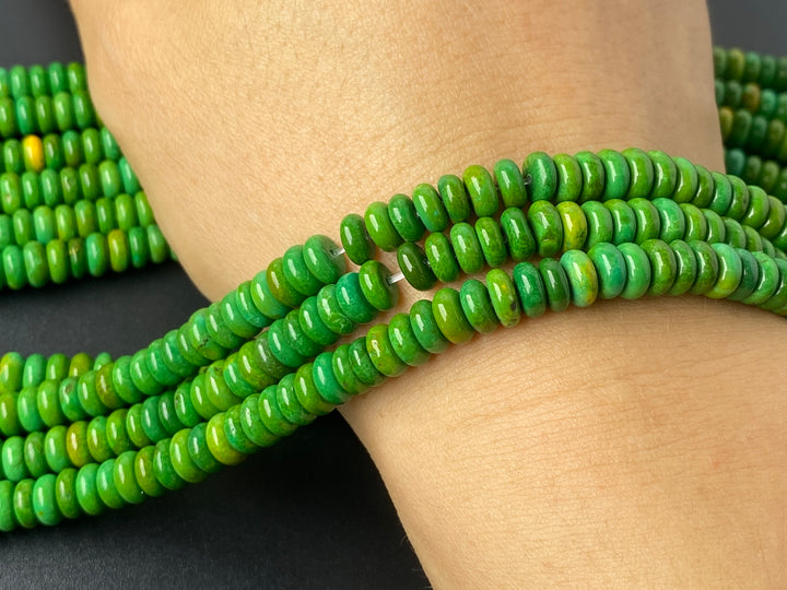 14.5" 3x6mm dark yellow green howlite turquoise rondelle/wheel beads
