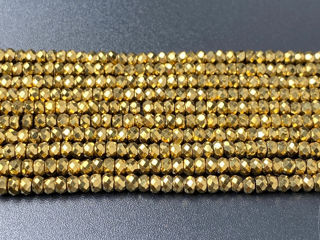 15.5" 2x3mm gold Hematite stone rondelle/roundel faceted beads