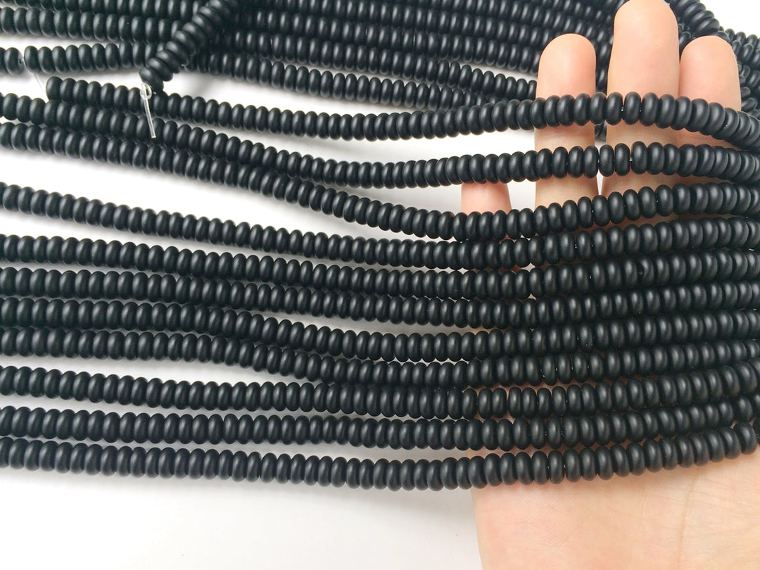 15.5" Matte/frosted black onyx/agate 4x8mm roundel beads, rondelle
