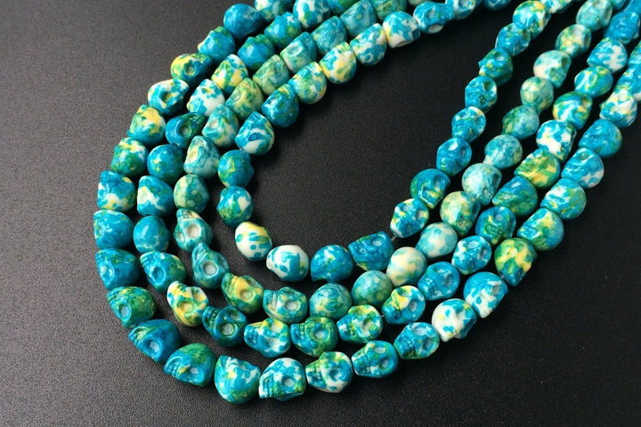 15.5" 10mm/12mm Dyed blue yellow rain flower stone skull