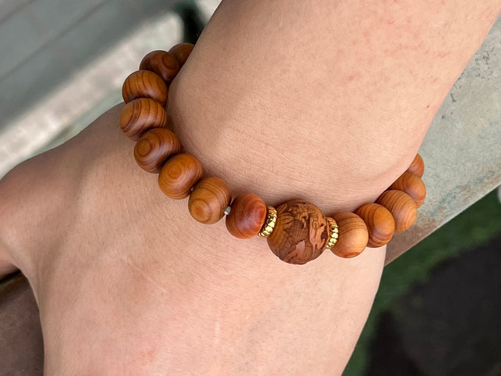 7.5" 9x11mm light Fragrant Cypress wood roundel beads elastic bracelets