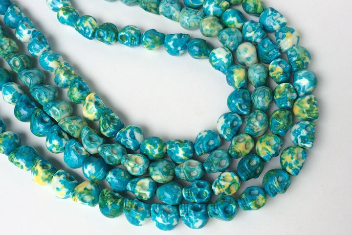 15.5" 10mm/12mm Dyed blue yellow rain flower stone skull