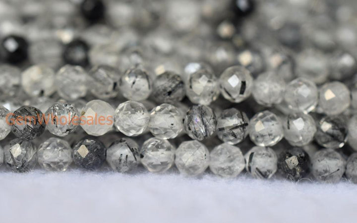 Rutilated Quartz - Round faceted- beads supplier