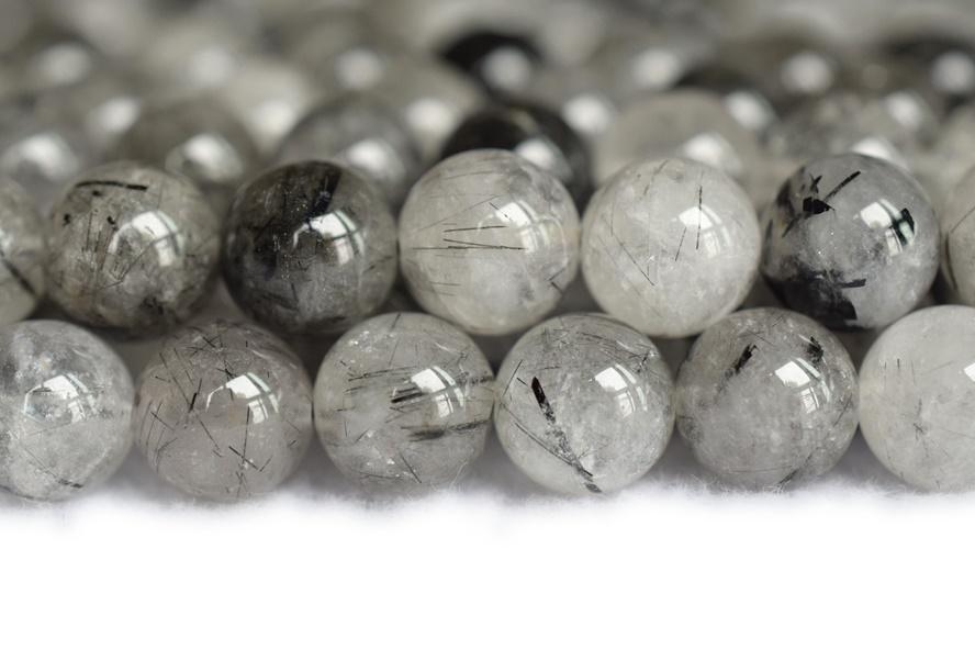 Rutilated Quartz - Round faceted- beads supplier