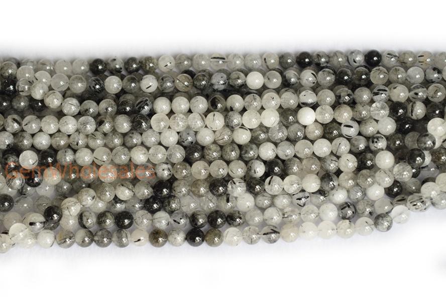 Rutilated Quartz - Round faceted- beads supplier