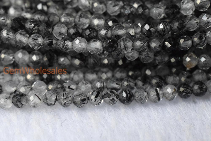 Rutilated Quartz - Round faceted- beads supplier