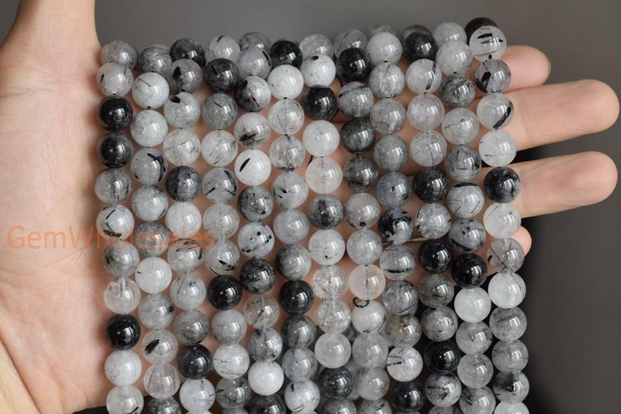 Rutilated Quartz - Round faceted- beads supplier