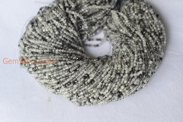 Rutilated Quartz - Round faceted- beads supplier