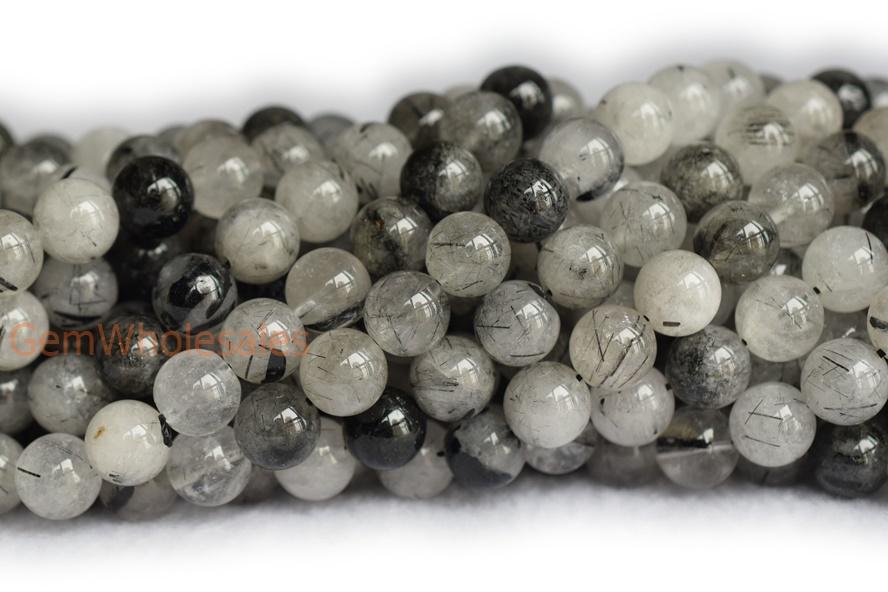 Rutilated Quartz - Round faceted- beads supplier