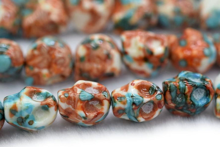 Rain flower stone - Skull- beads supplier