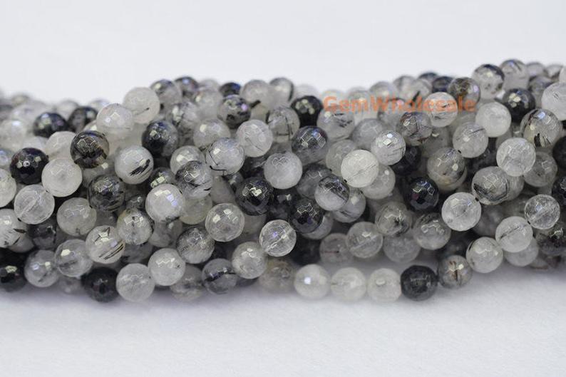 Rutilated Quartz - Round faceted- beads supplier