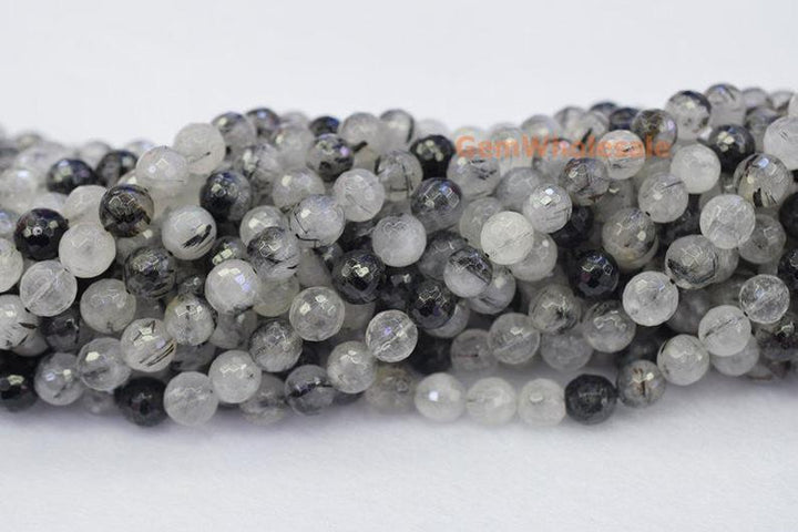 Rutilated Quartz - Round faceted- beads supplier