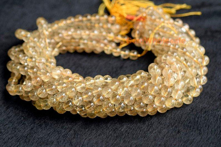 Rutilated Quartz - round- beads supplier
