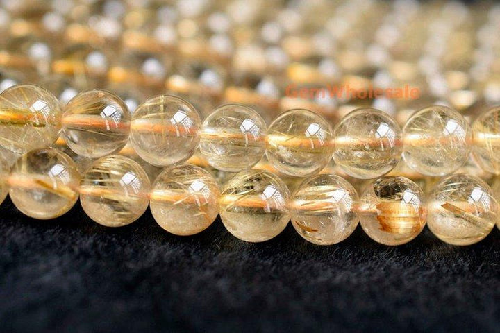 Rutilated Quartz - round- beads supplier