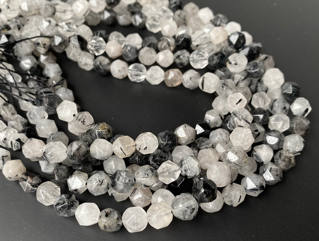 15.5" 10mm Natural black rutilated quartz star faceted beads
