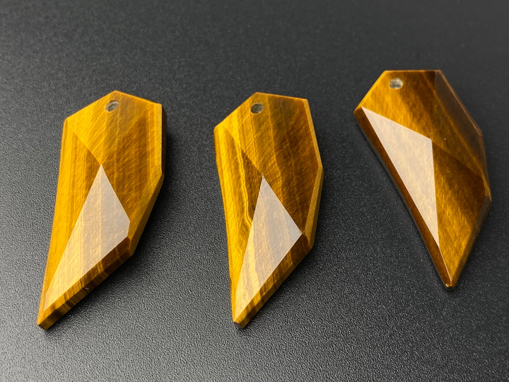 1PC 42x17mm AAA Natural yellow tiger eye faceted tiger tooth pendant