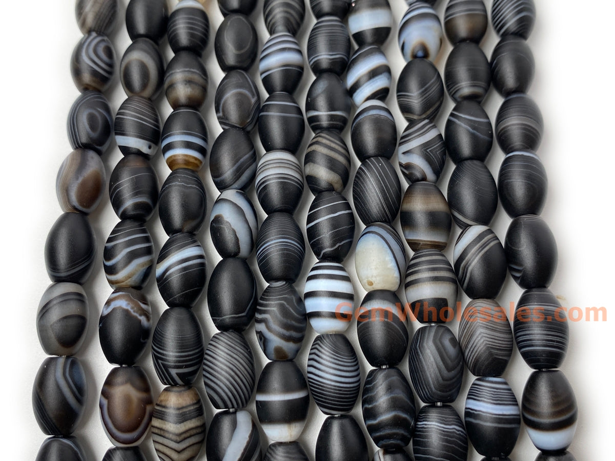 15.5" 8x12mm matte/frosted black stripe Agate oval/rice beads