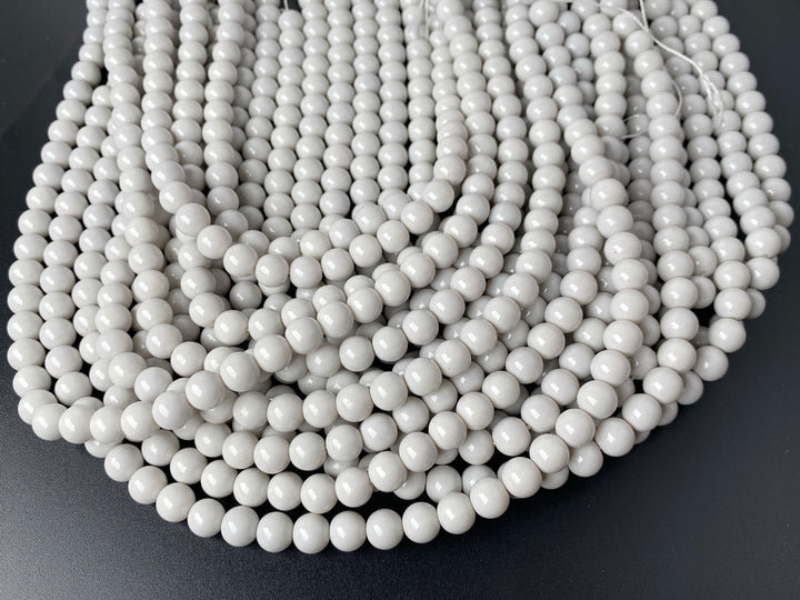 15.5" Glass druk round beads grey 6mm/8mm