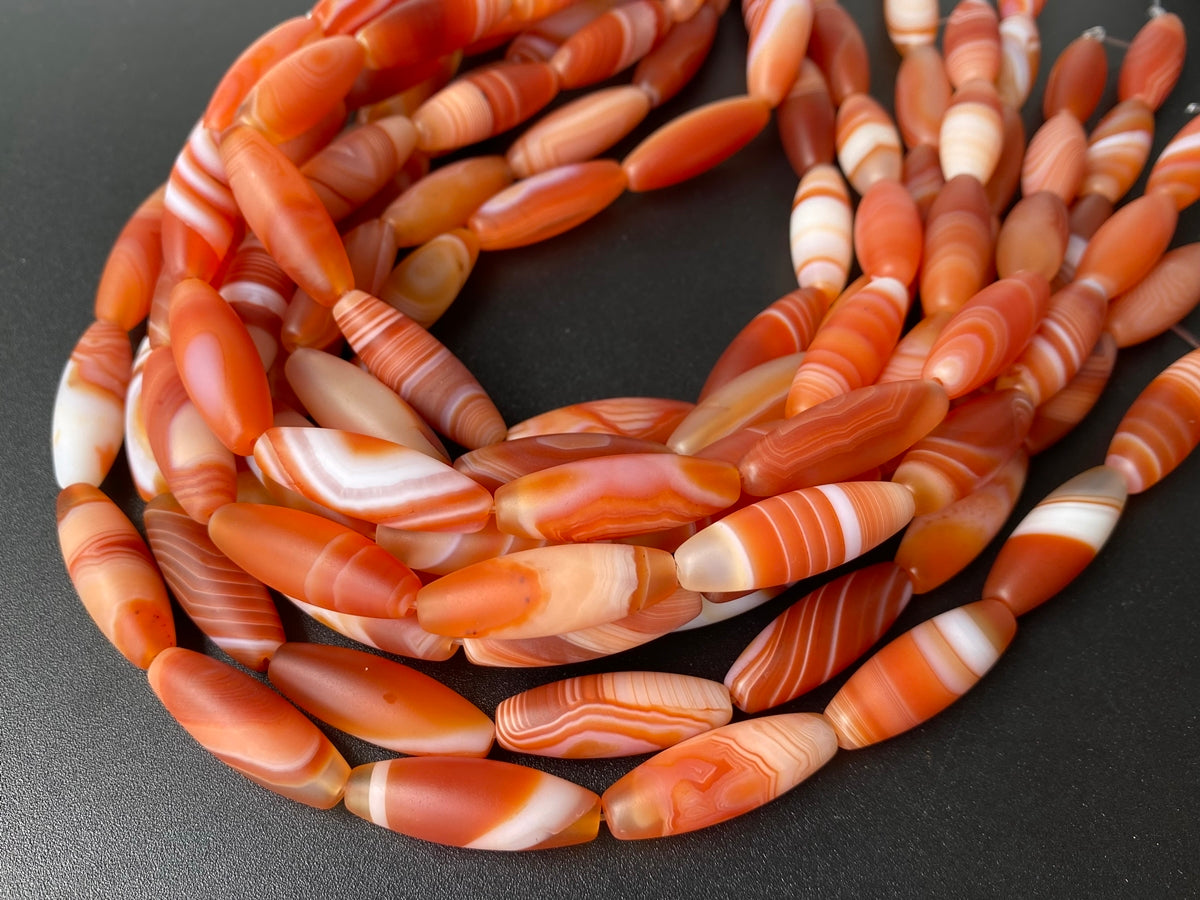 15" 10x30mm matte/frosted red stripe Agate oval/rice beads