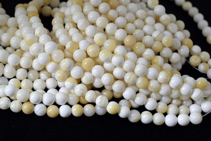 15.5" 10mm/12mm Natural half yellow shell round beads