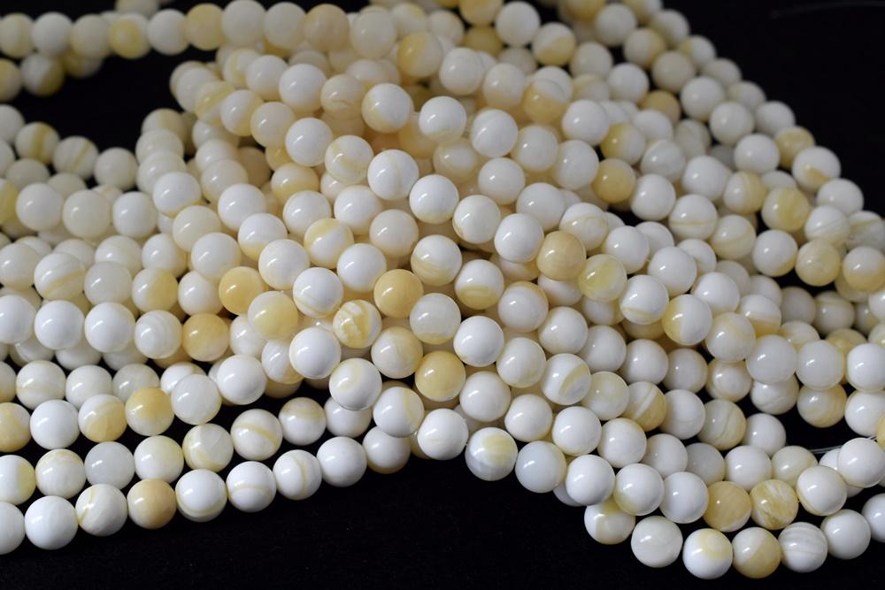 15.5" 10mm/12mm Natural half yellow shell round beads