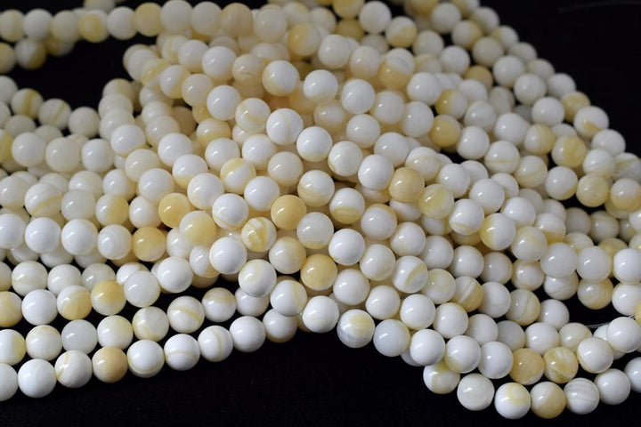 15.5" 10mm/12mm Natural half yellow shell round beads
