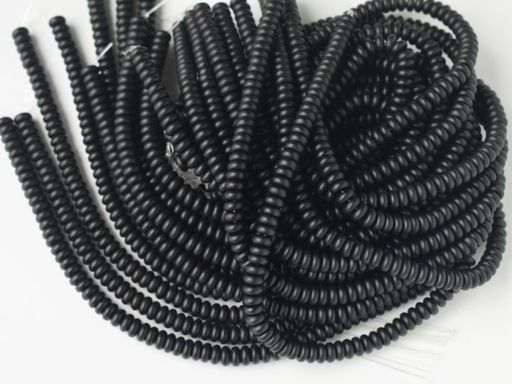 15.5" Matte/frosted black onyx/agate 4x8mm roundel beads, rondelle