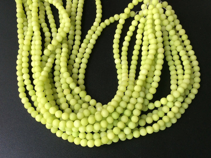 15.5" 6mm/10mm matte apple green dyed jade round beads