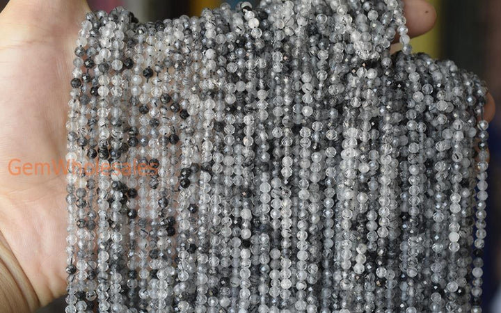 Rutilated Quartz - Round faceted- beads supplier