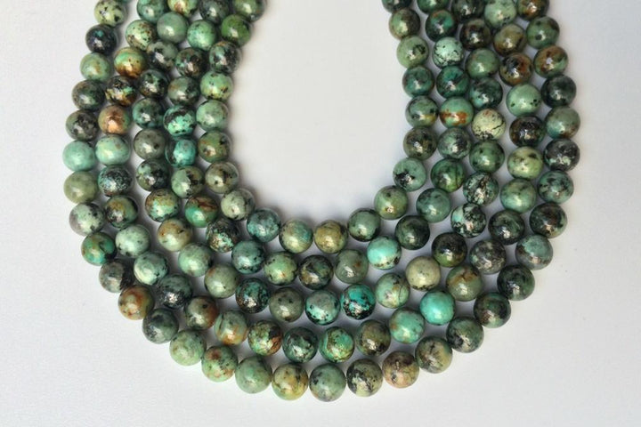 15.5" Natural African turquoise 10mm/12mm round beads