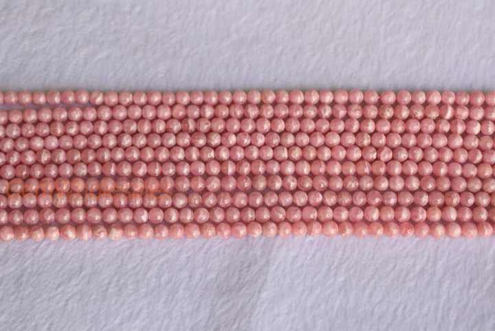 Rhodochrosite - Round- beads supplier