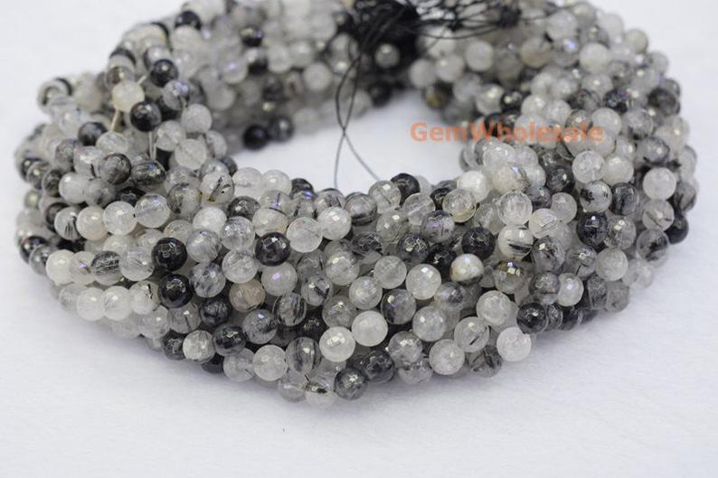 Rutilated Quartz - Round faceted- beads supplier