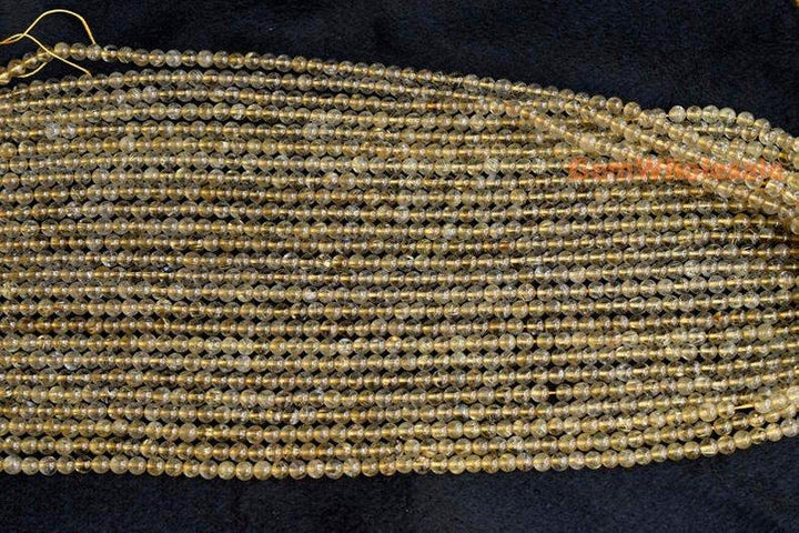 Rutilated Quartz - round- beads supplier